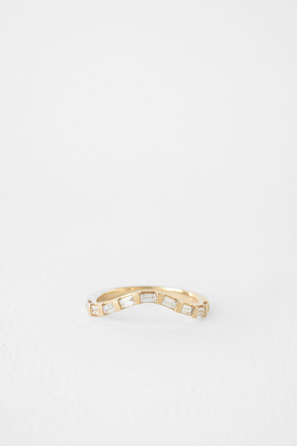 Baguette curved channel set lab grown diamond wedding band