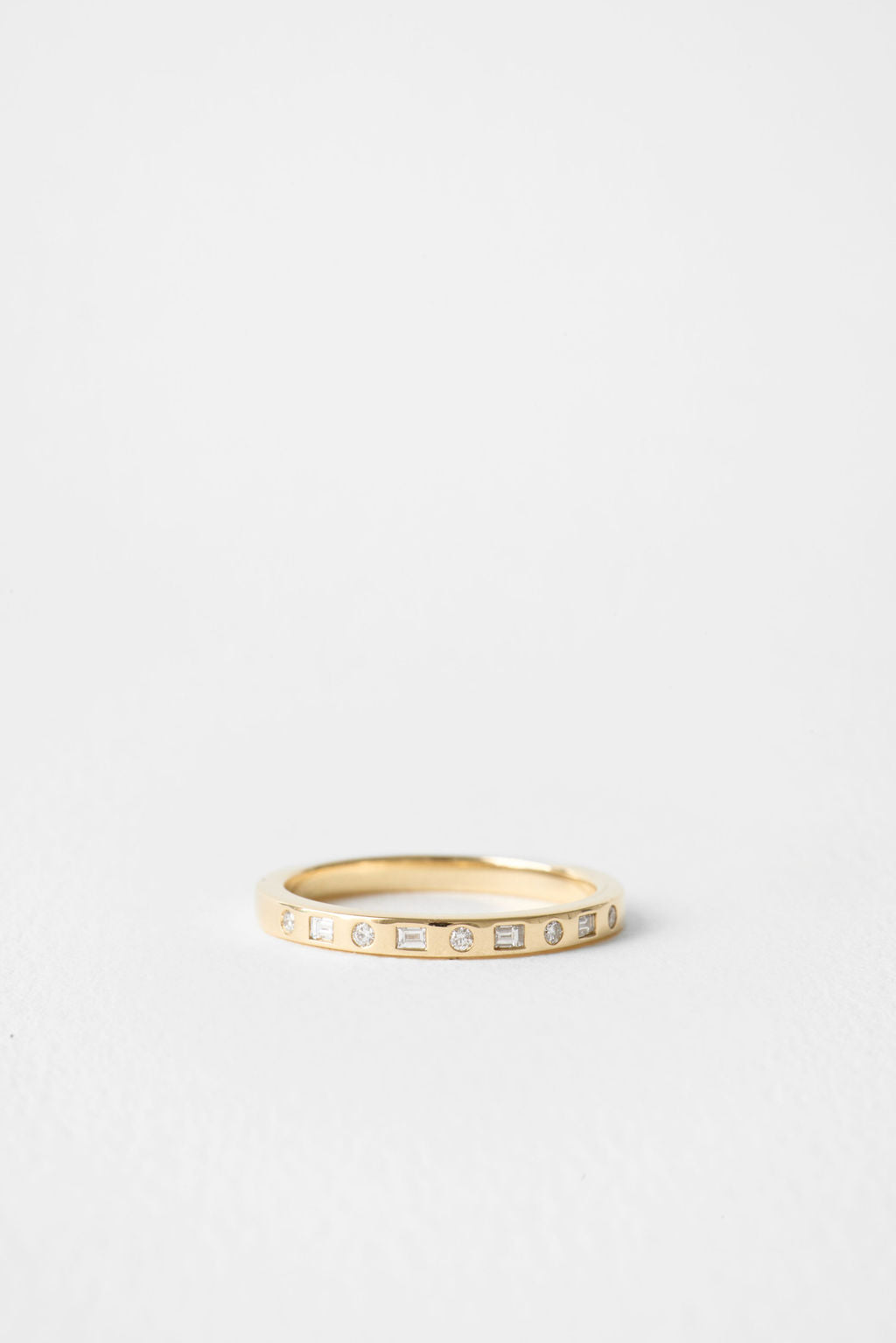 Flush set round and baguette lab grown diamond wedding band