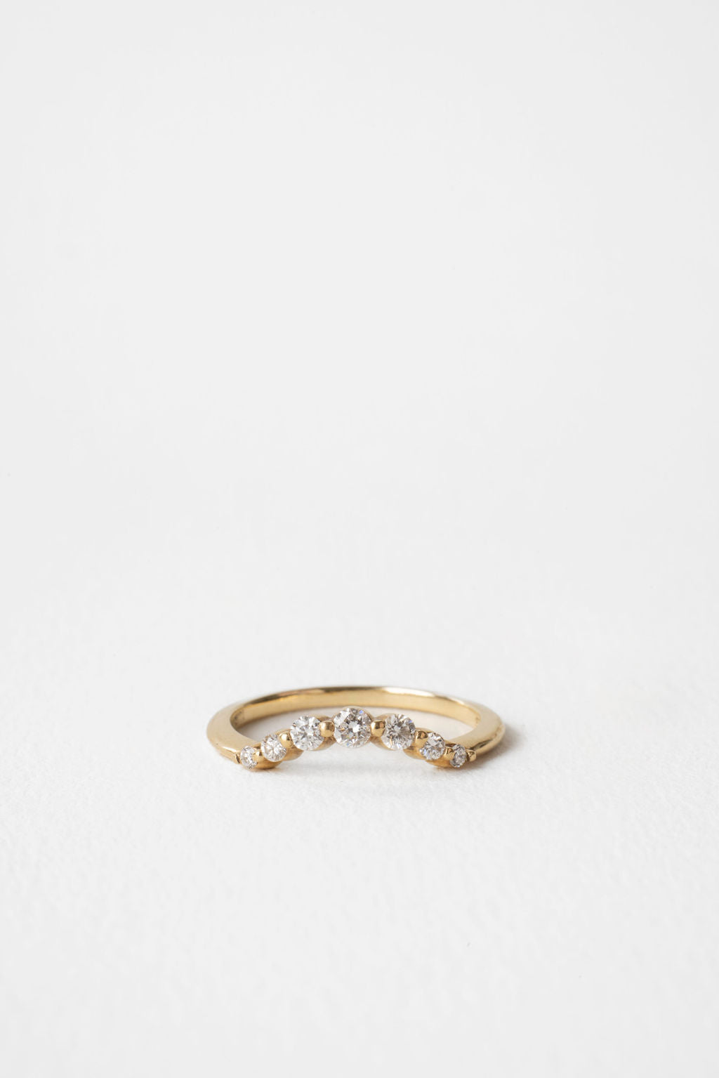 Round curved graduated shared prong lab grown diamond wedding band