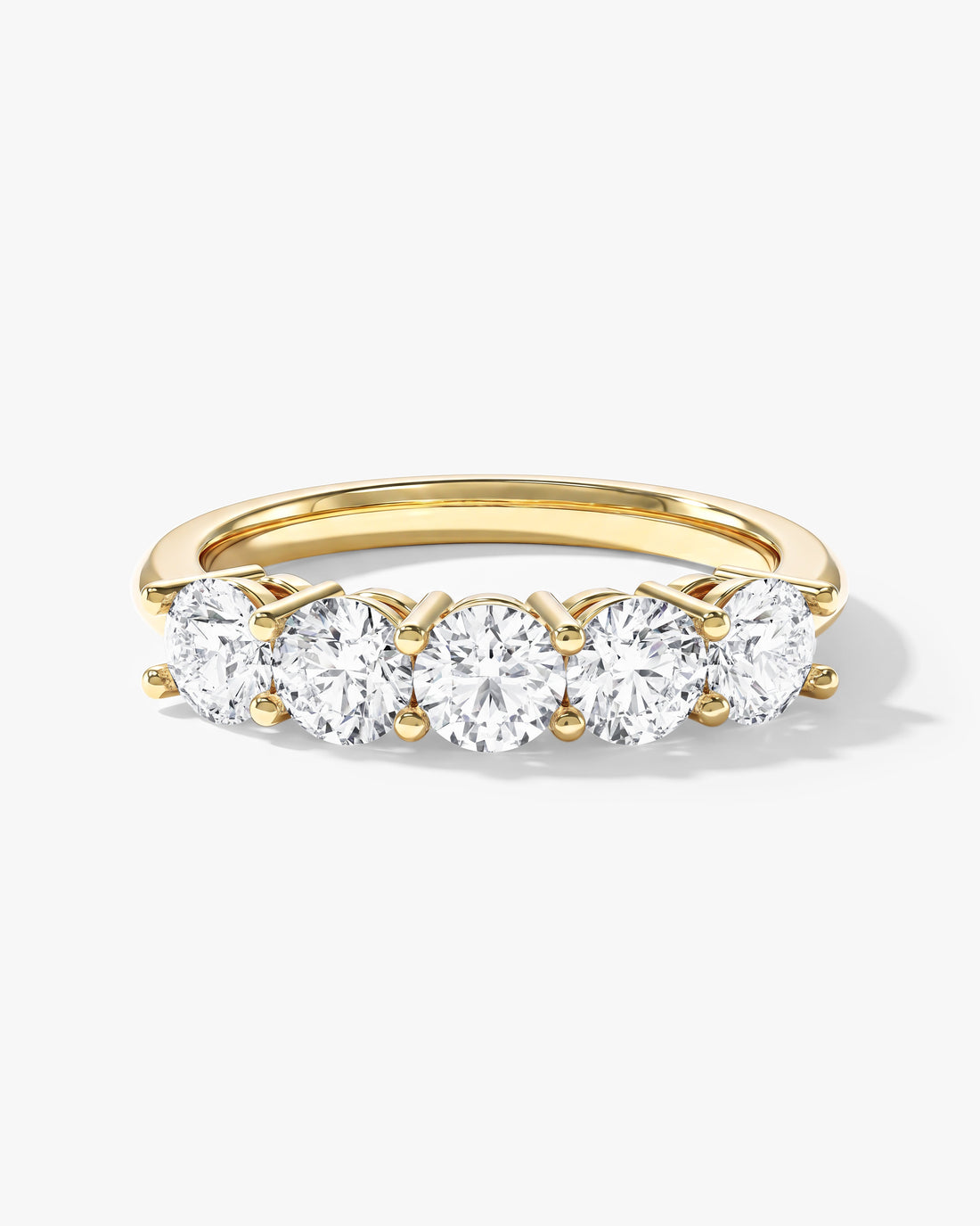Round moissanite classic five stone 1 carat anniversary band in yellow gold, front view