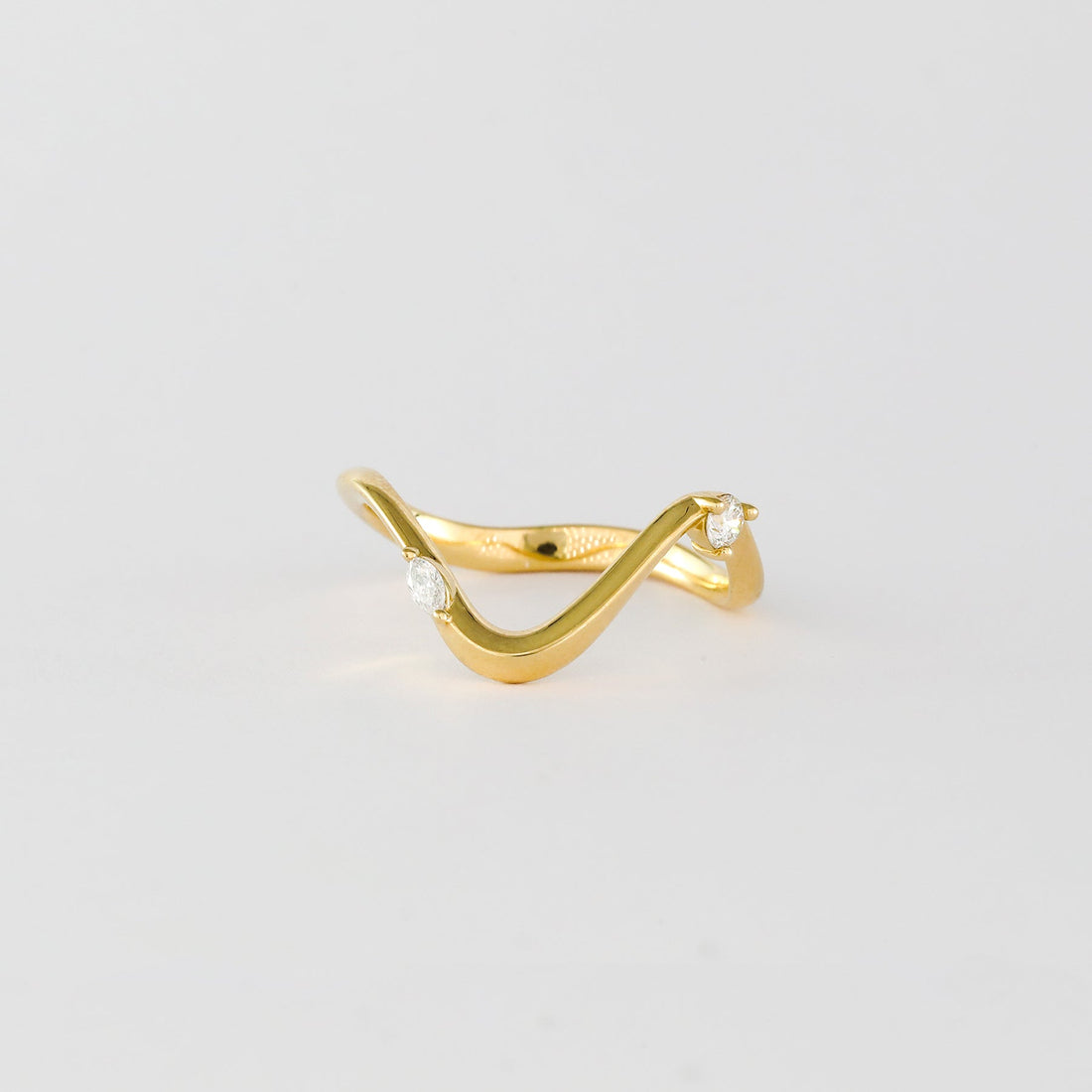 Marquise and round lab grown diamond curved wave wedding band in yellow gold