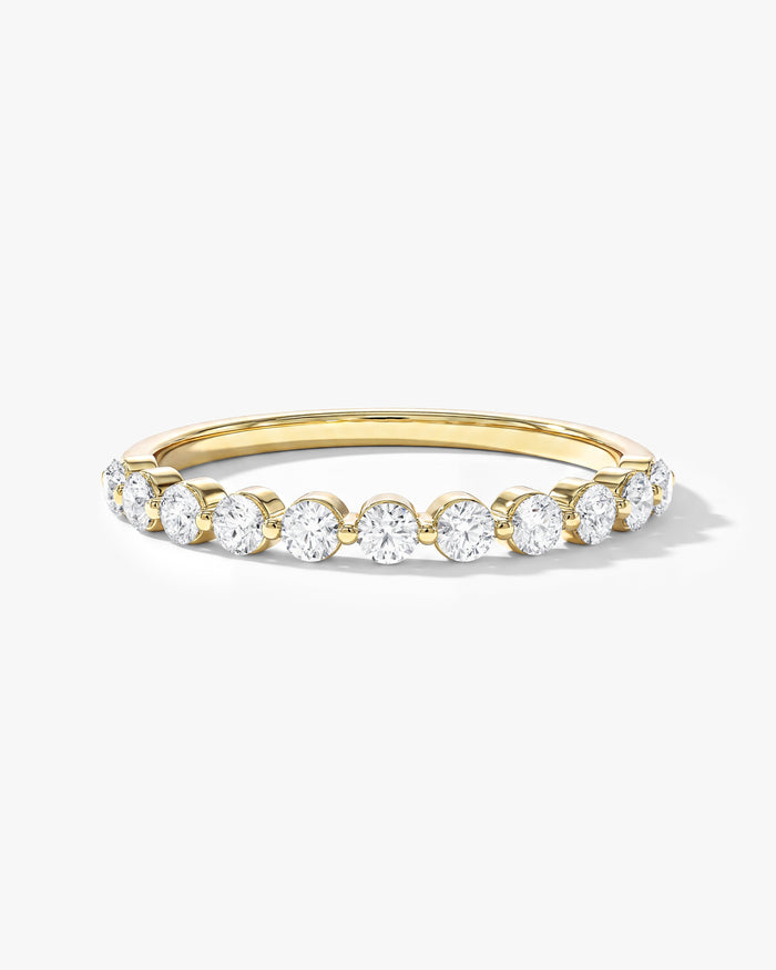 Round moissanite floating eleven stone anniversary band in yellow gold, front view
