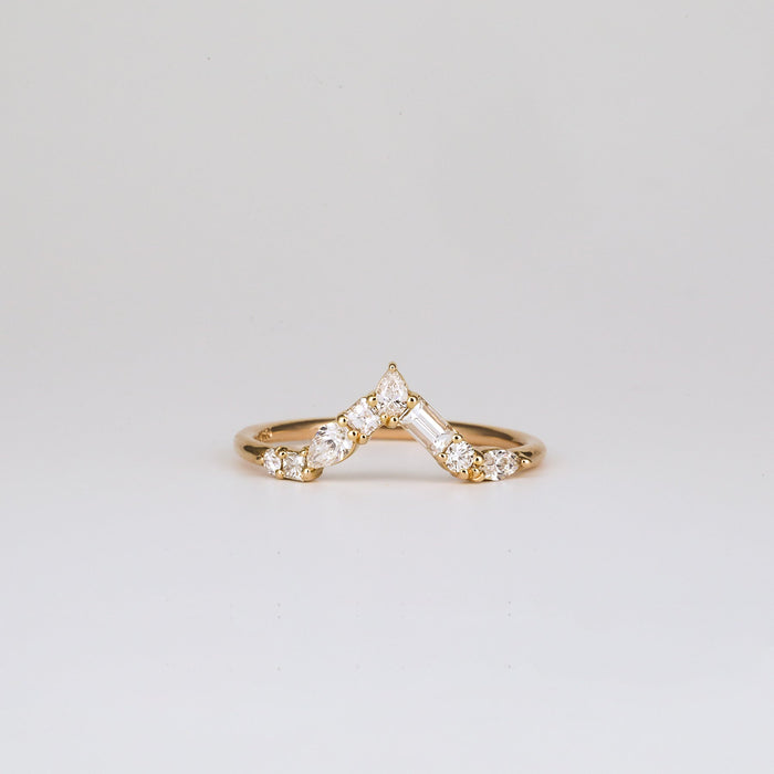 Mixed shape moissanite curved cluster wedding band in yellow gold, front view