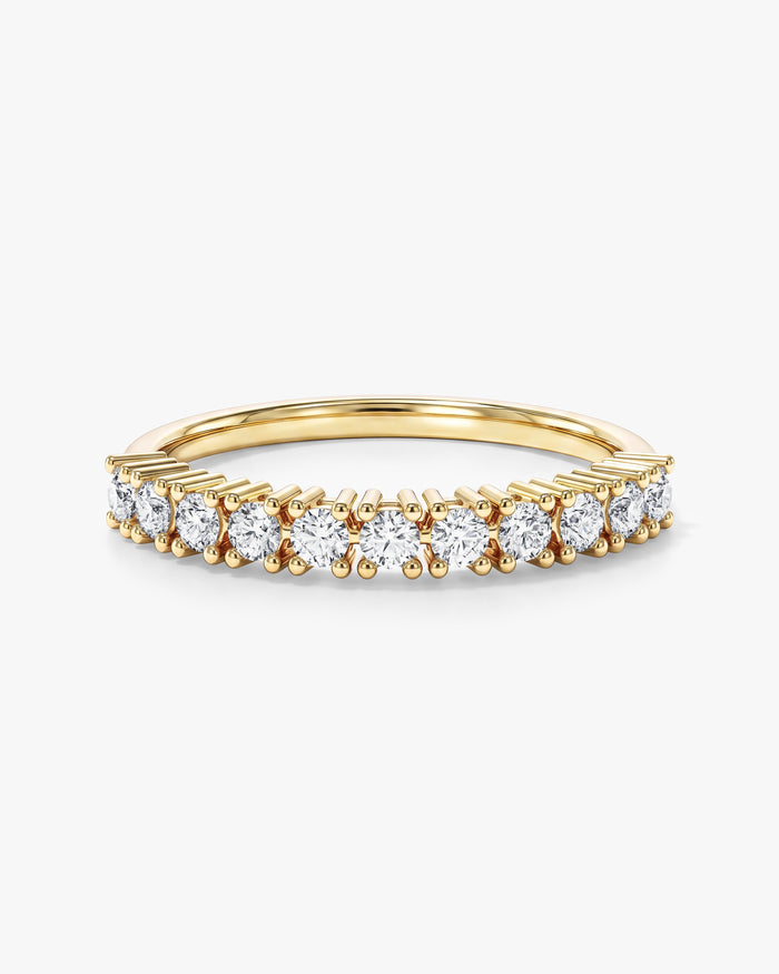 Round moissanite eleven stone basket anniversary band in yellow gold, front view