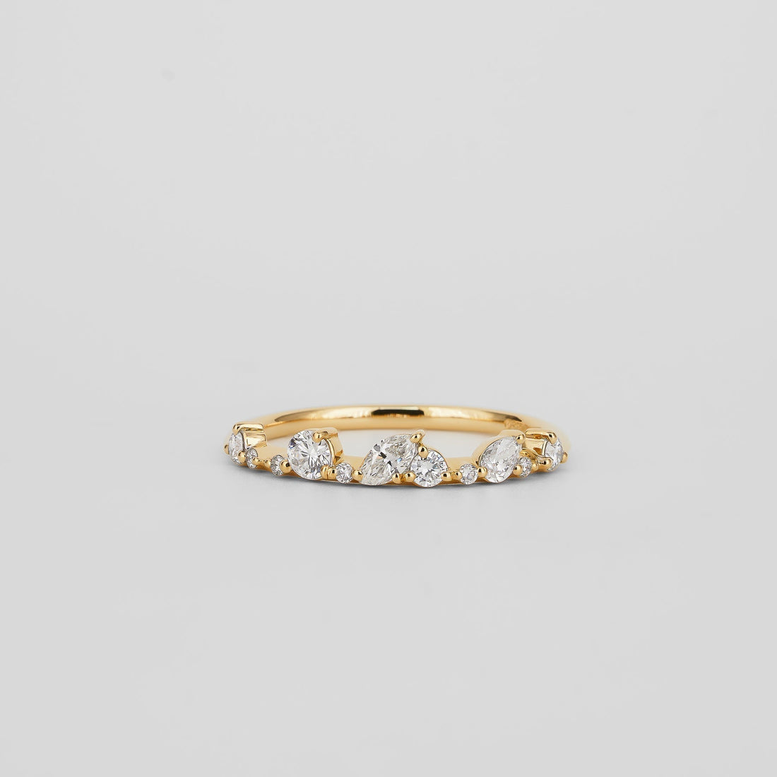 Pear, round and marquise lab grown diamond cluster wedding band in yellow gold, front view