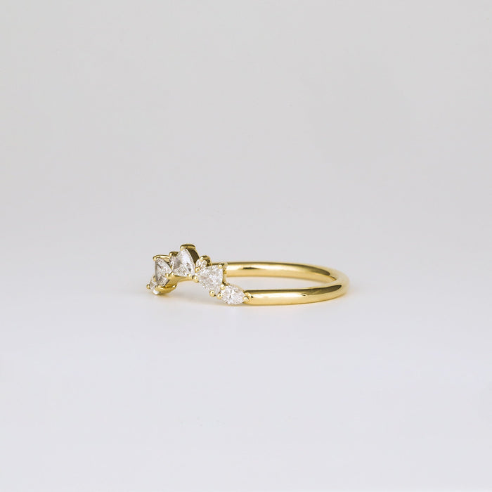 Round and trillion moissanite curved cluster wedding band, side view