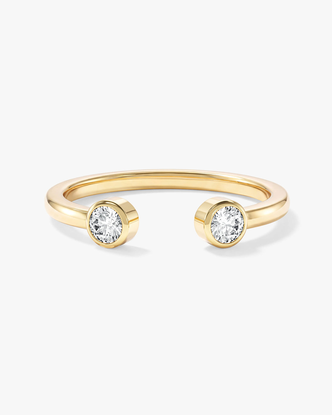 Round moissanite bezel open cuff wedding band in yellow gold