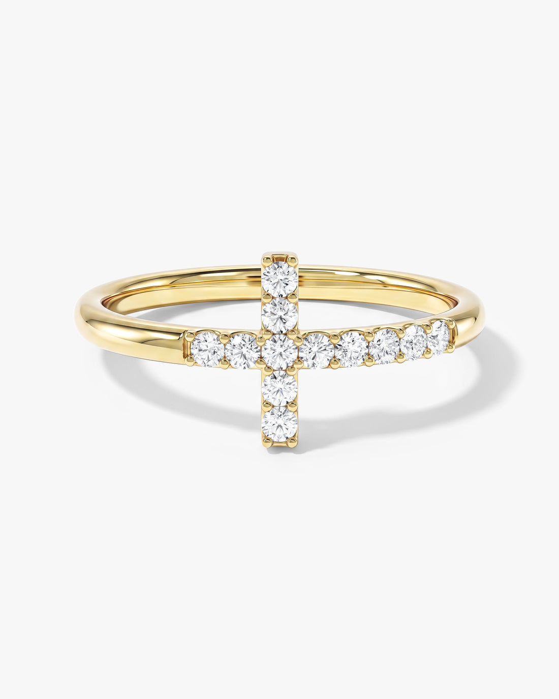 Round moissanite cross wedding band in yellow gold