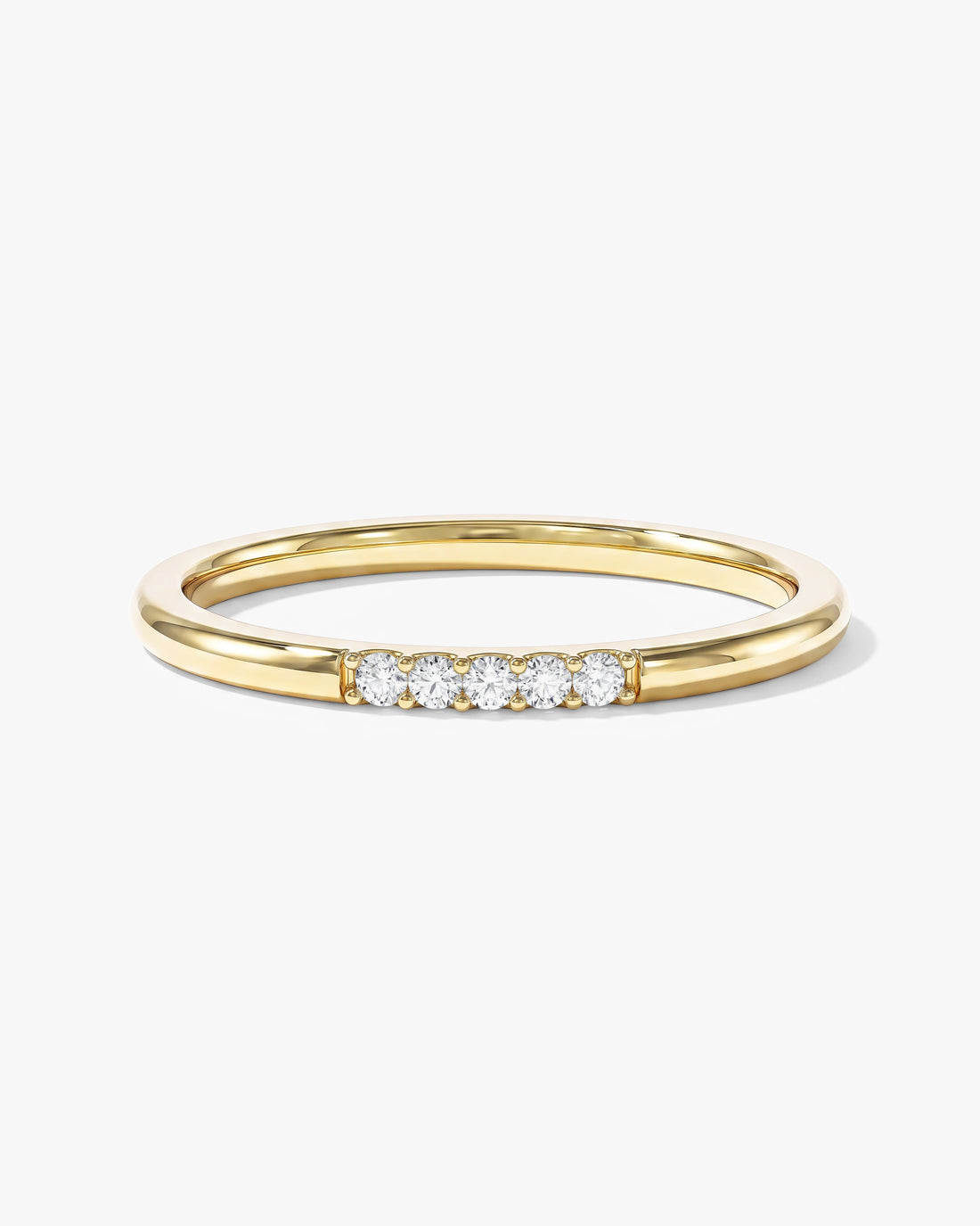 Round moissanite minimalist five-stone wedding band in yellow gold
