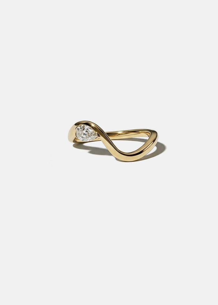 Pear moissanite curved wedding band in yellow gold, front view
