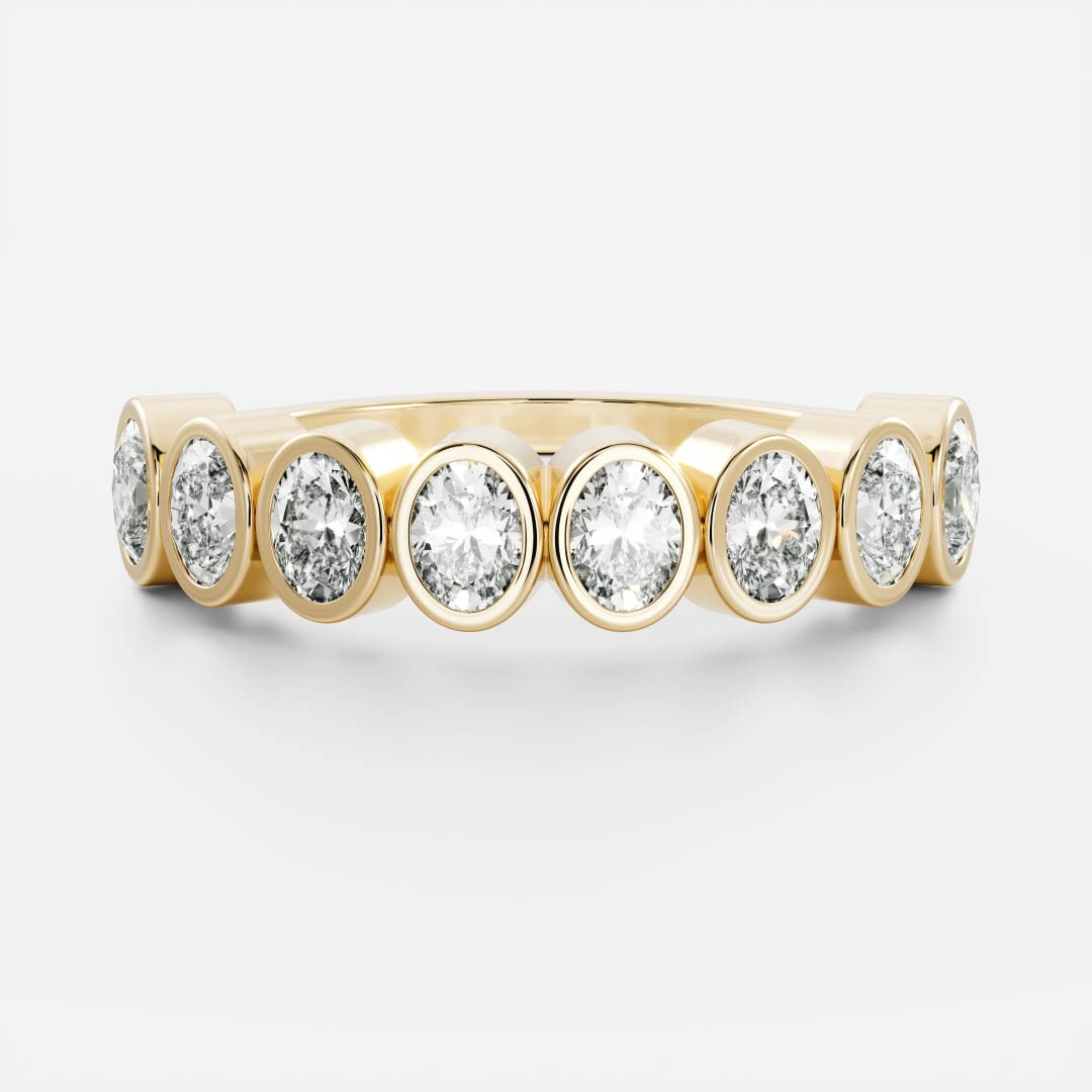 Oval lab grown diamond bezel half eternity wedding band in yellow gold, front view