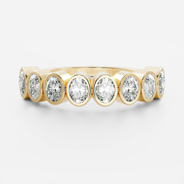 Oval moissanite bezel half eternity wedding band in yellow gold, front view