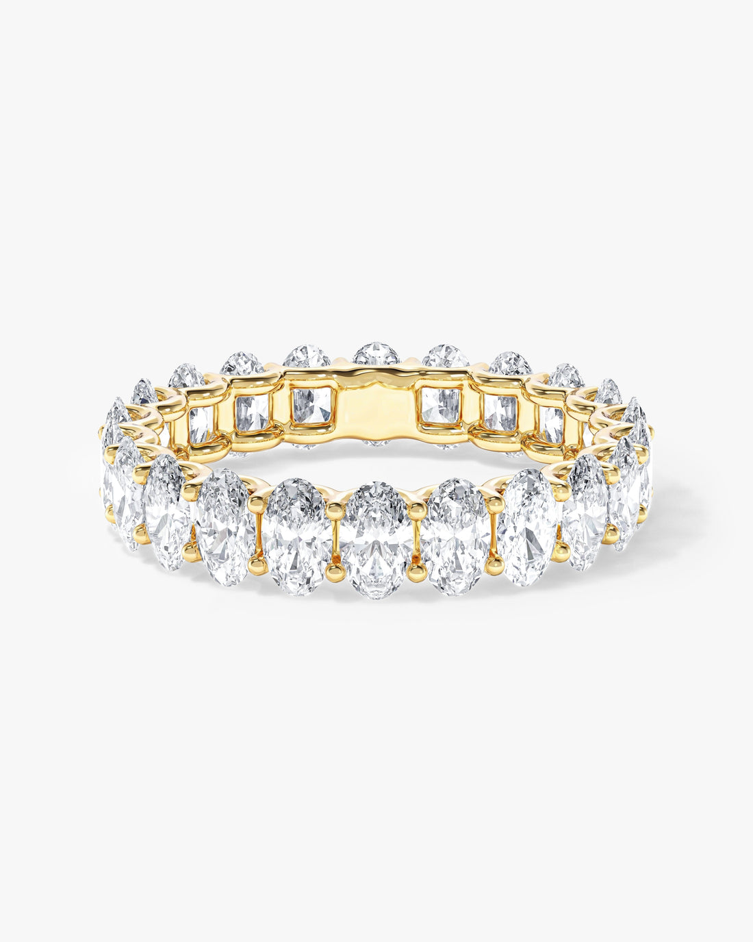 5.00 carat oval moissanite U-prong eternity wedding band in yellow gold