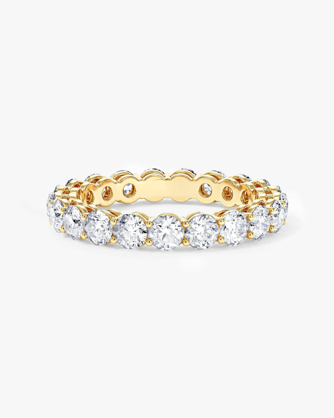 2.00 carat round moissanite shared prong eternity wedding band in yellow gold