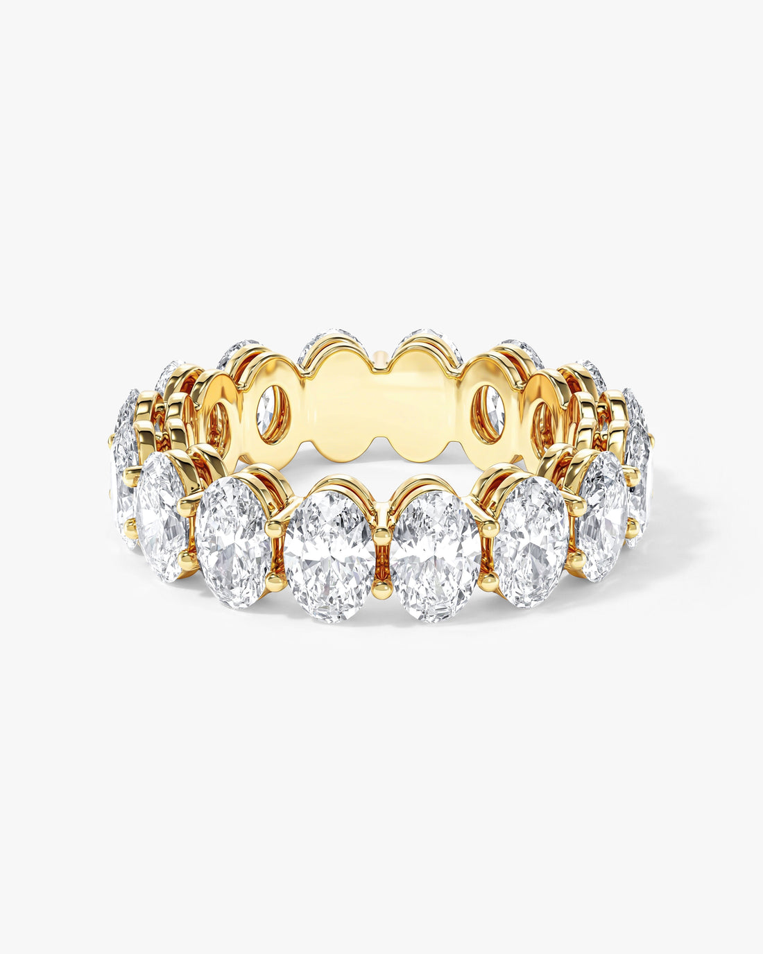 6mm oval moissanite shared prong eternity wedding band in yellow gold