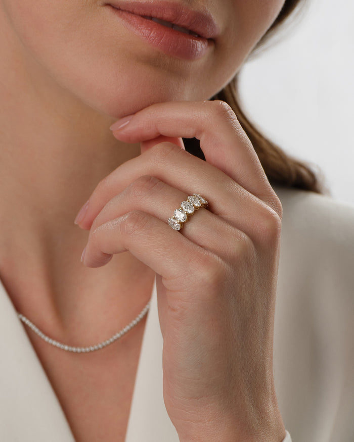 6mm oval moissanite shared prong eternity wedding band photo 2