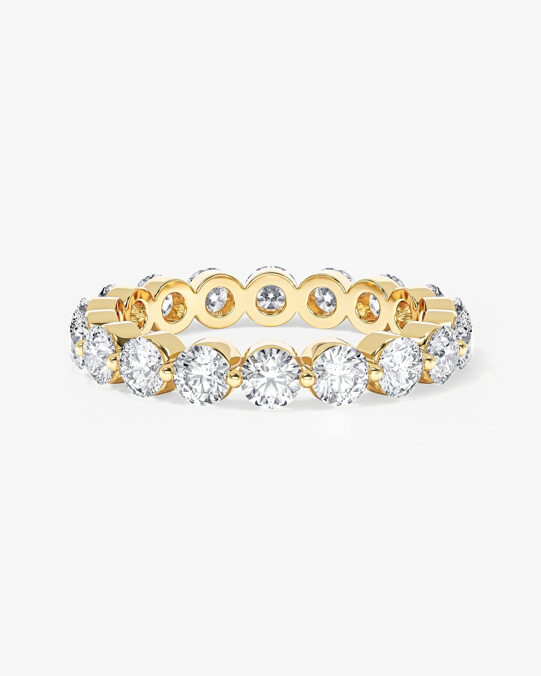 3mm round moissanite single prong eternity wedding band in yellow gold