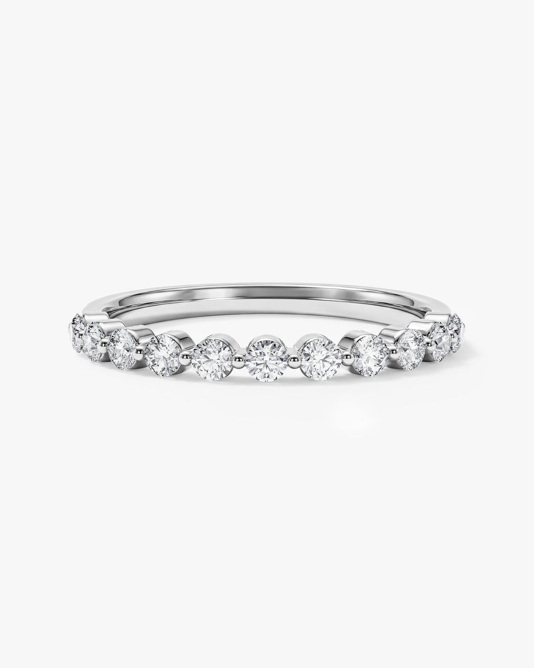 2mm round moissanite single prong half eternity wedding band in white gold