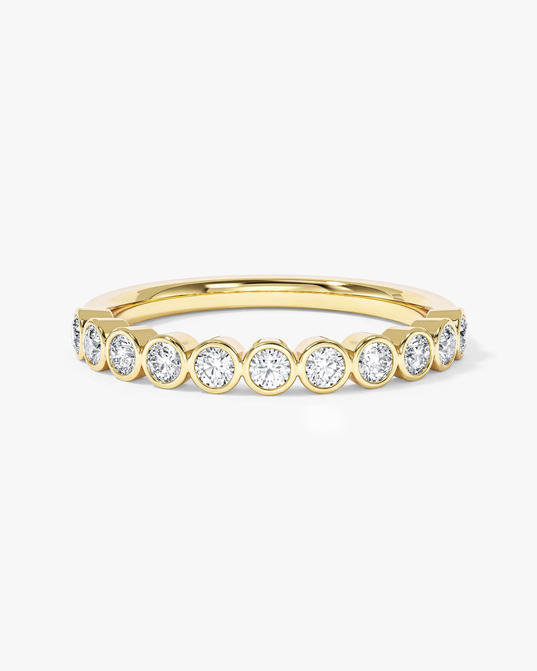 Round moissanite bezel half eternity wedding band in yellow gold, front view