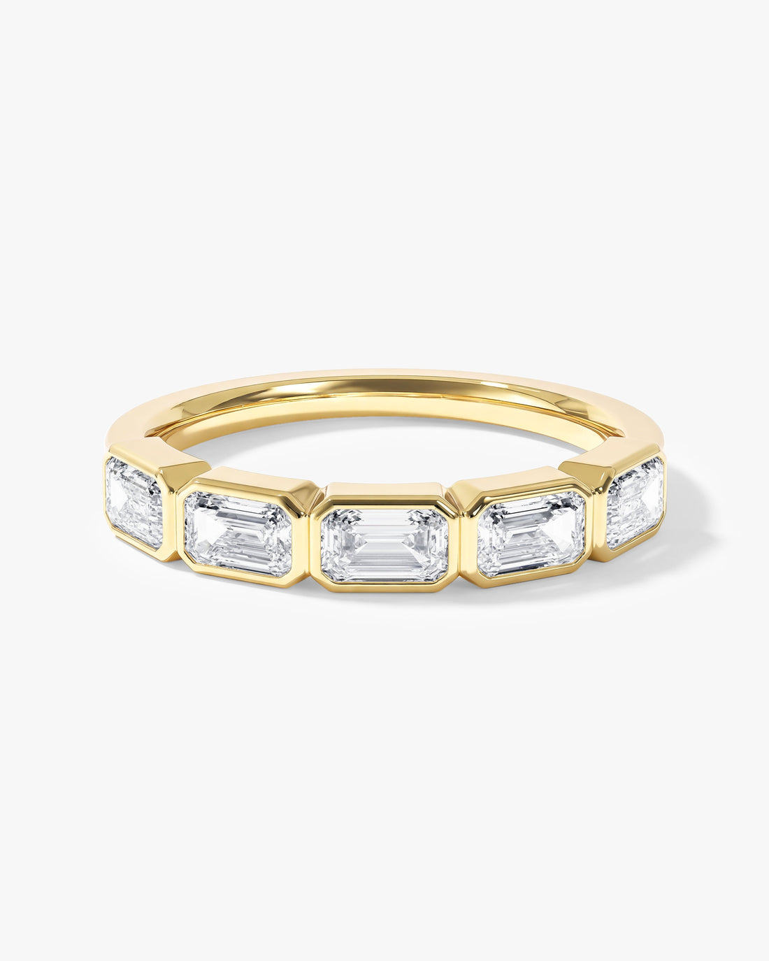 East-west emerald cut moissanite bezel half eternity band in yellow gold, front view