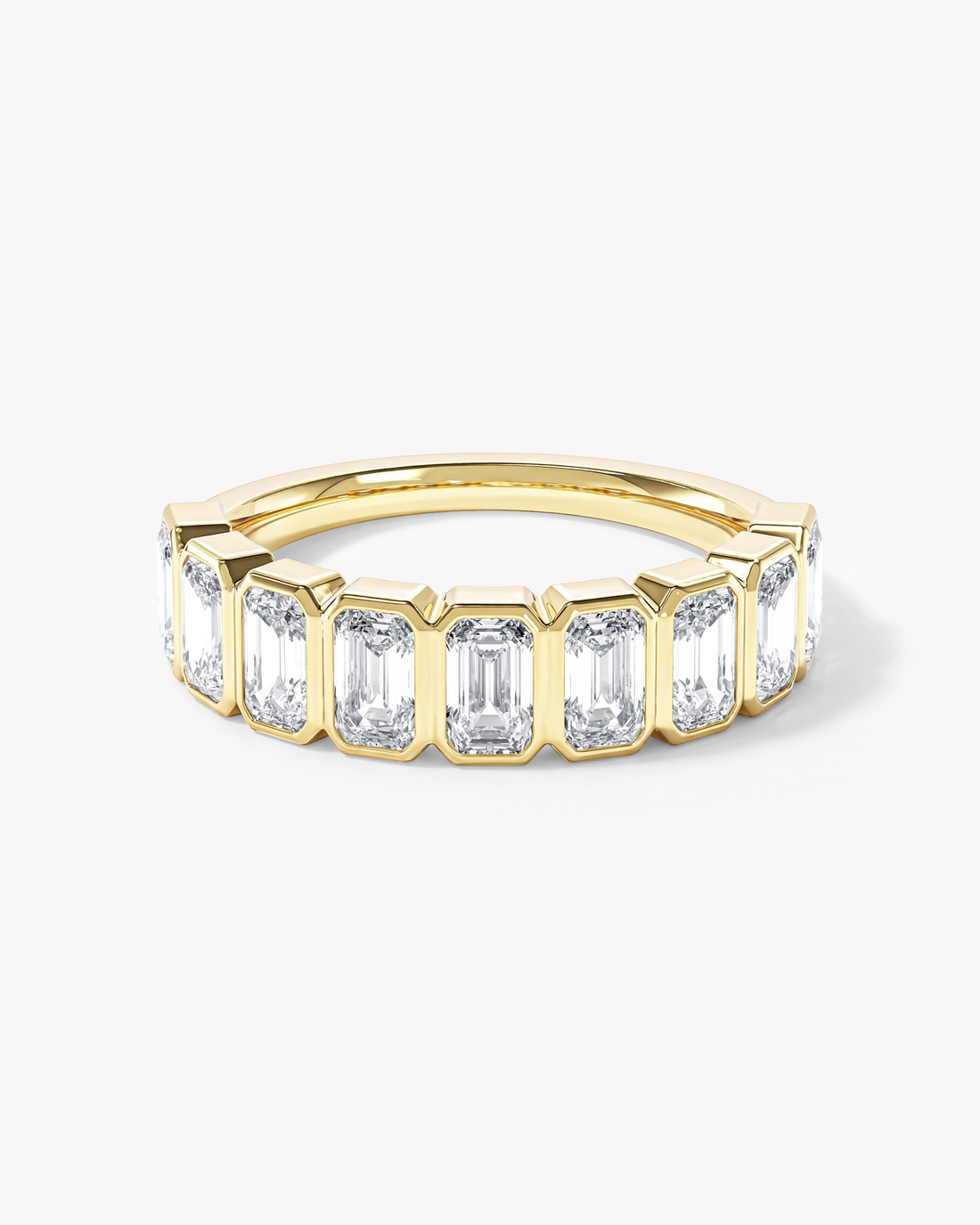 Emerald moissanite bezel half eternity wedding band in yellow gold, front view