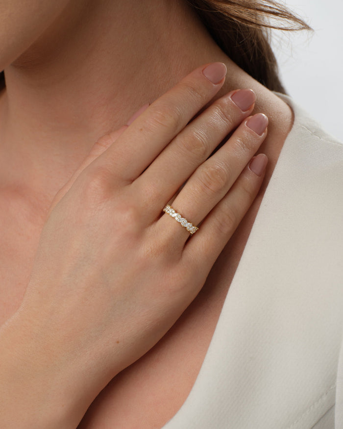 Marquise and round moissanite cluster band worn on the hand