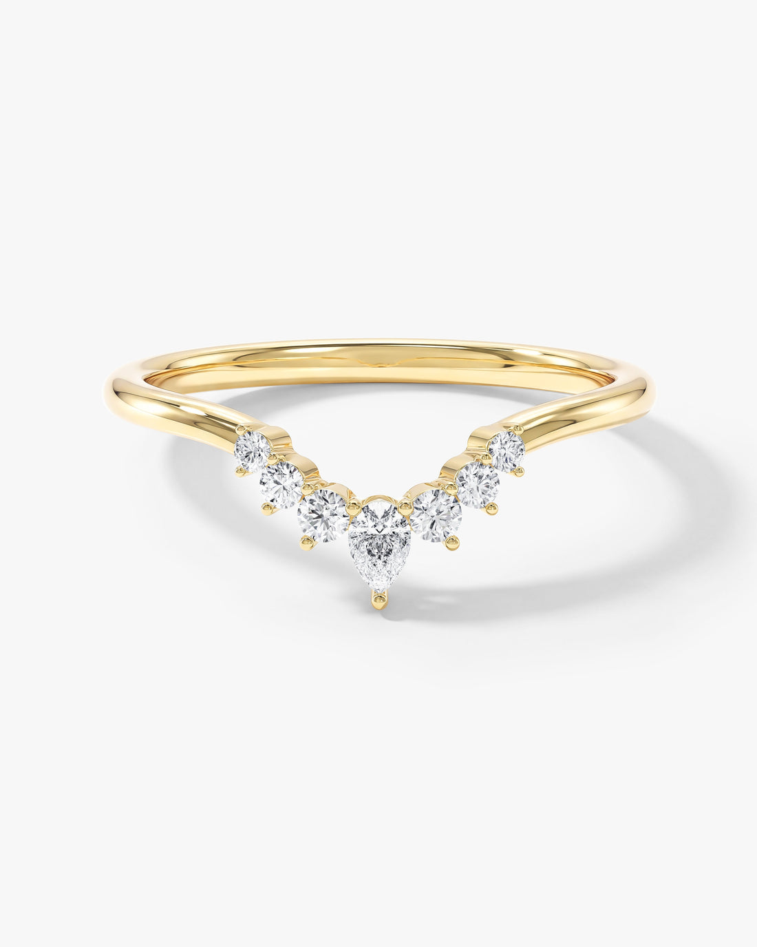 Pear and round moissanite crown curved nesting wedding band in yellow gold, front view