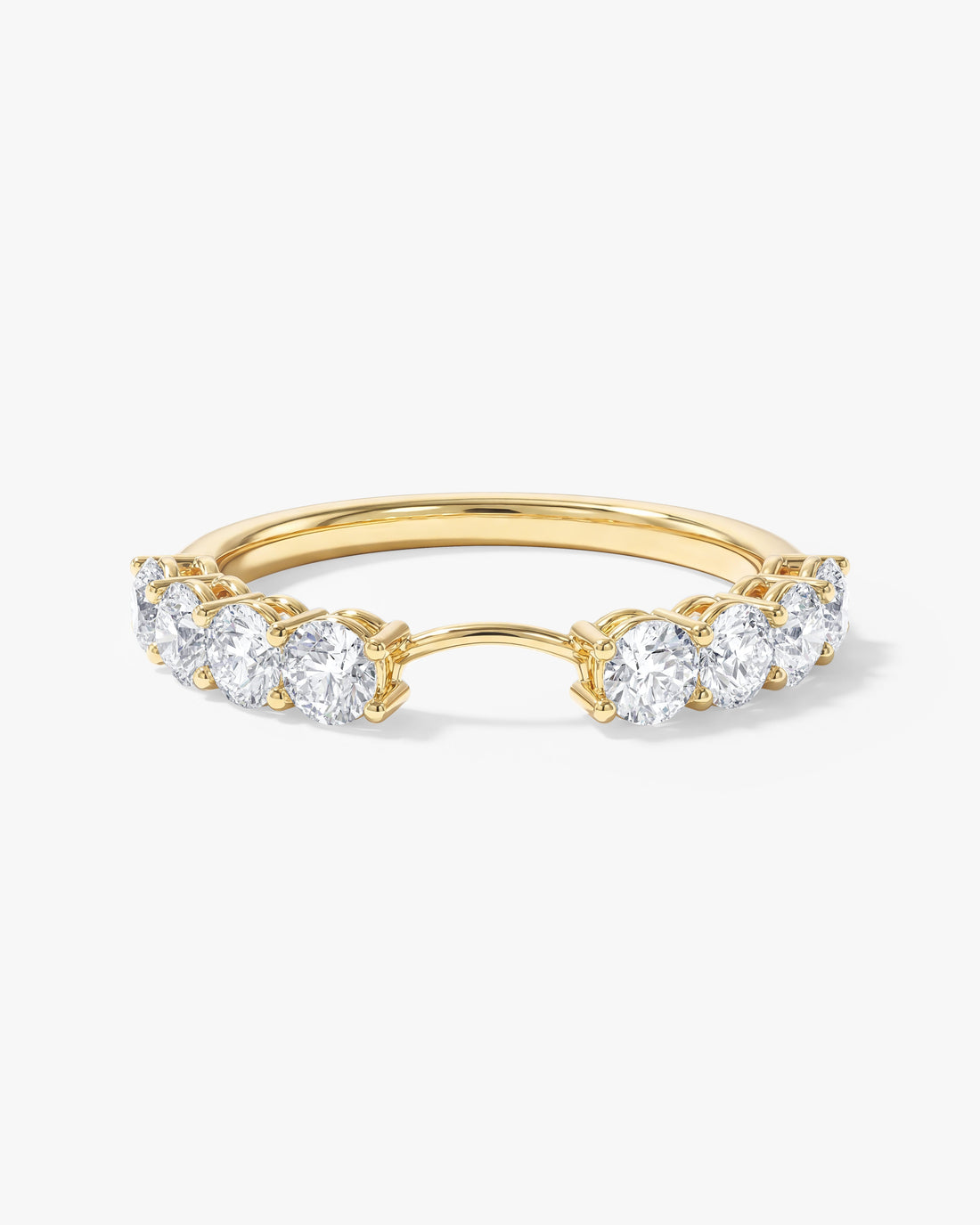 Round moissanite curved nesting wedding band in yellow gold with an open center curve