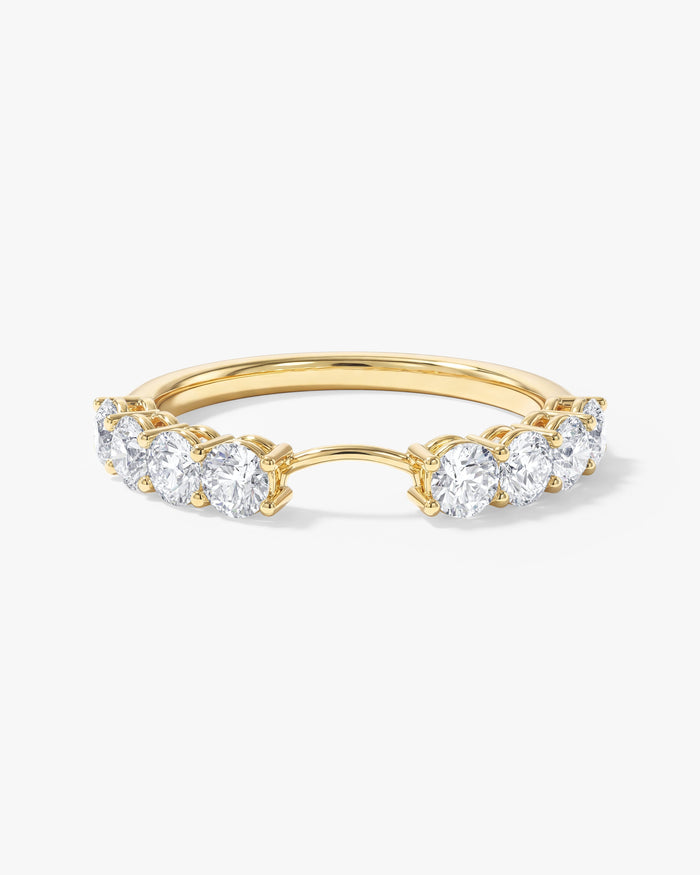 Round moissanite curved nesting wedding band in yellow gold with an open center curve