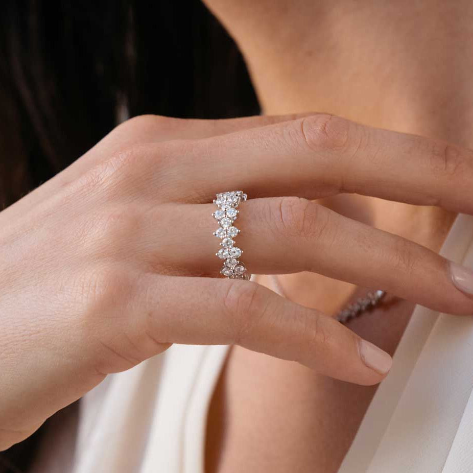 Round lab grown diamond cluster wedding band worn on the finger