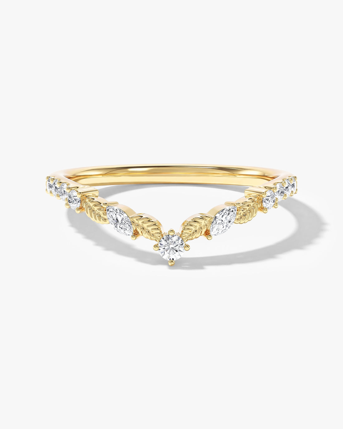 Petal floral curved nesting wedding band with marquise and round moissanite in yellow gold, front view