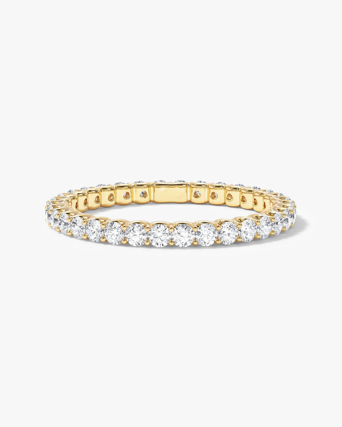 Round moissanite U-prong full eternity wedding band in yellow gold