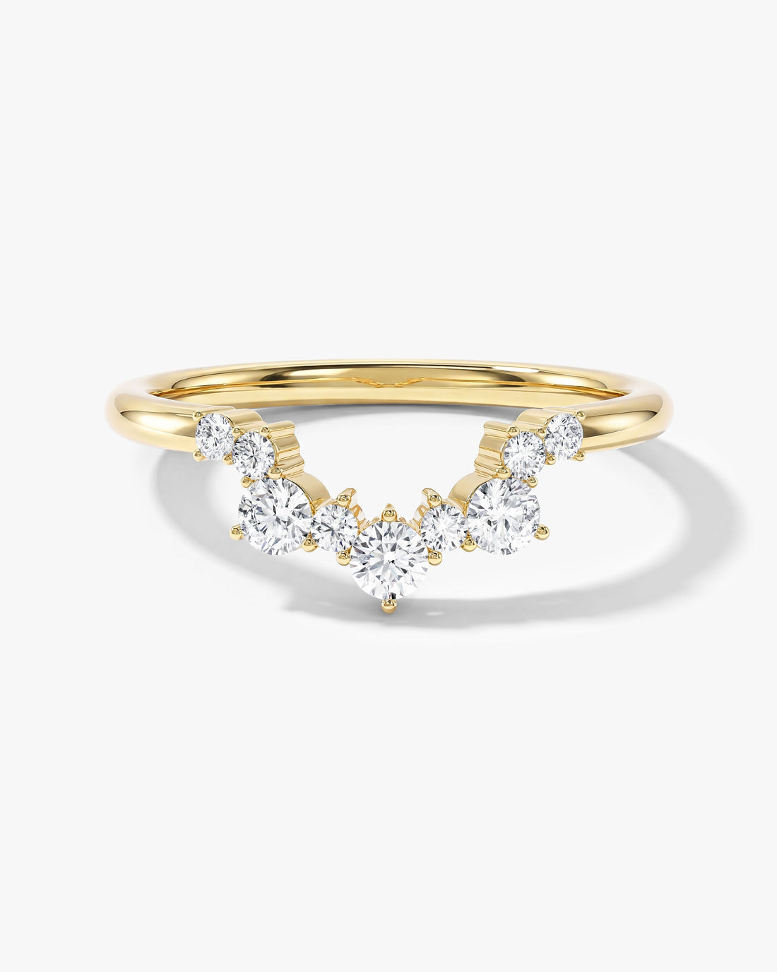 Round moissanite curved cluster wedding band in yellow gold