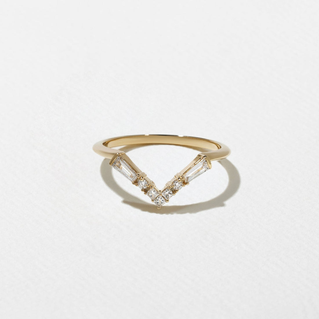 Curved V-shaped lab grown diamond wedding band front view