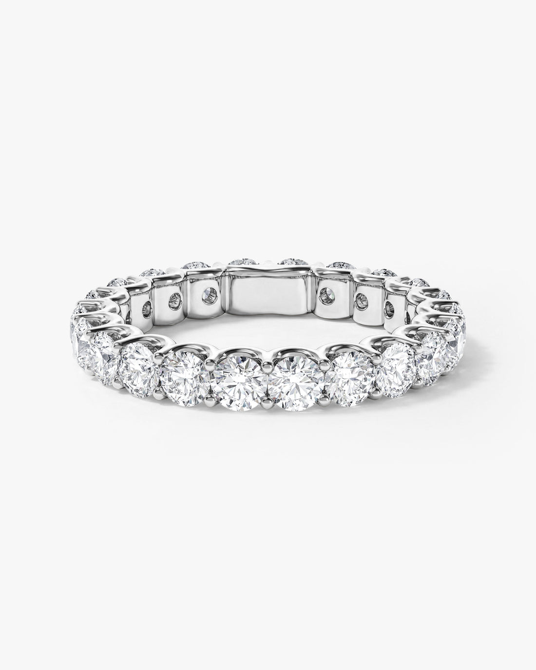 Round moissanite U-prong full eternity wedding band in white gold