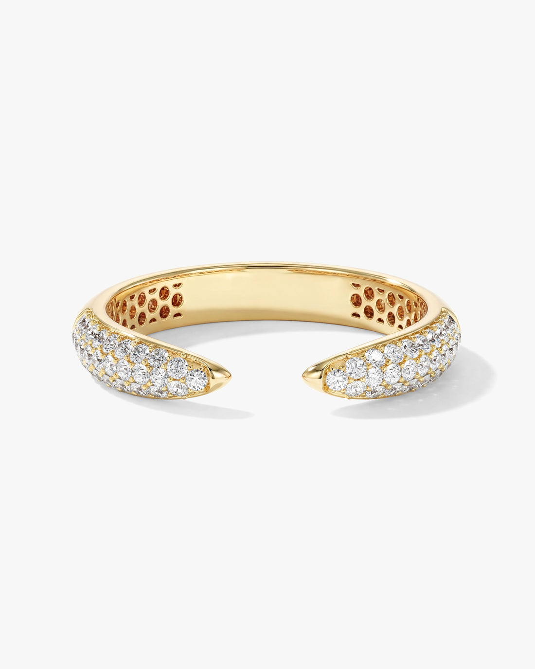 Round moissanite pave cuff wedding band in yellow gold