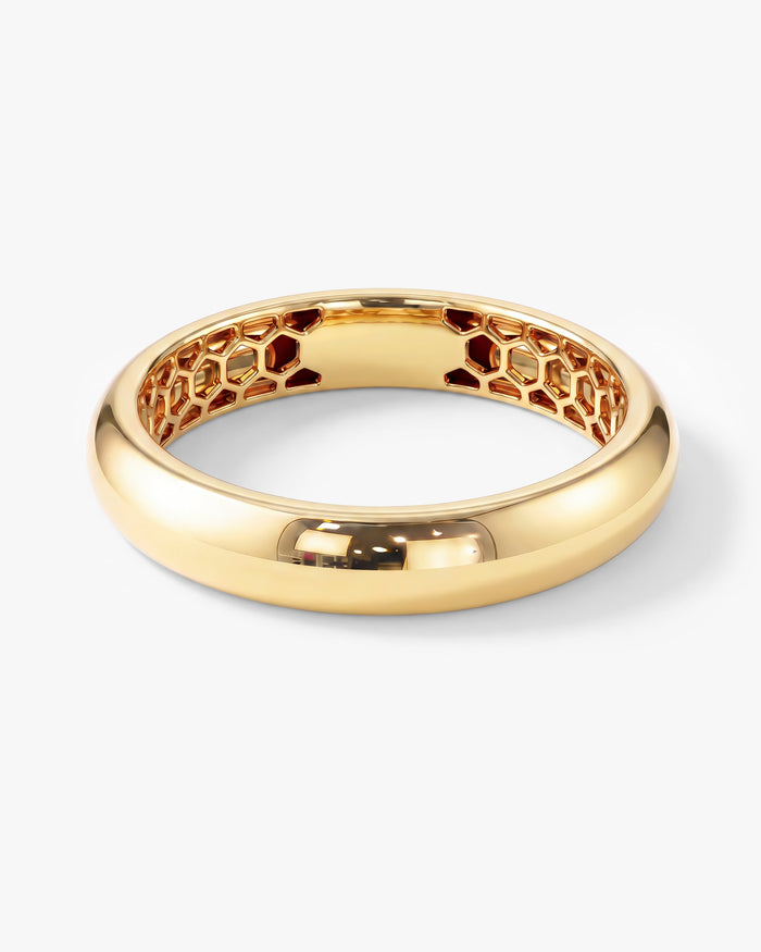 4mm dome wedding band with honeycomb interior in yellow gold