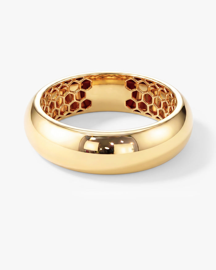 6mm dome wedding band with honeycomb interior in yellow gold