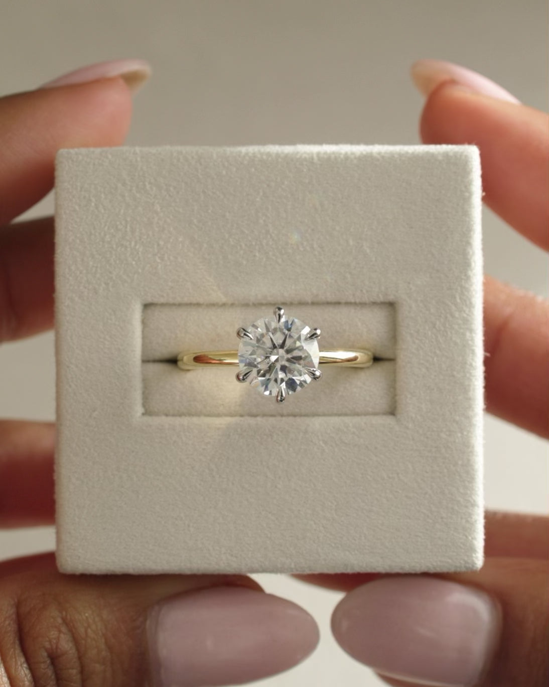 Round Cut Moissanite Hidden Halo Solitaire Engagement Ring with Slim Plain Band - view 1