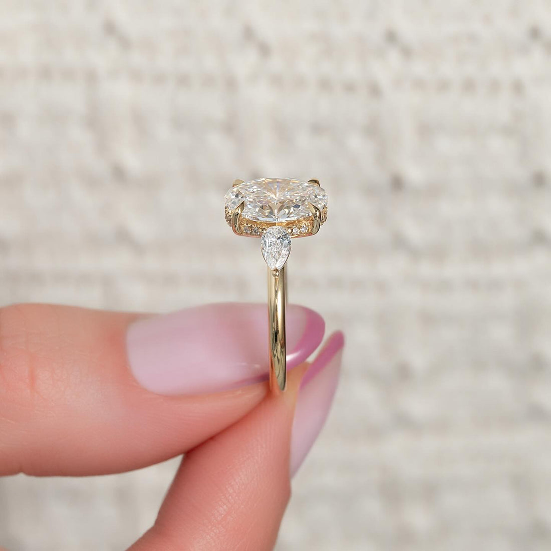 Oval Cut Moissanite Three Stone Pear Side Engagement Ring in 14K Gold — Mapple Gems