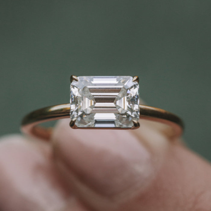 Emerald Cut Moissanite East West Four Prong Solitaire Engagement Ring - front view 2
