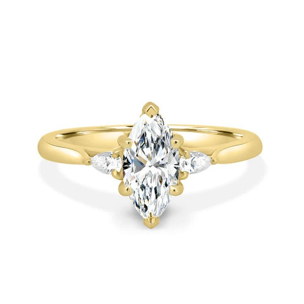 Marquise cut lab grown diamond three stone ring with pear side stones