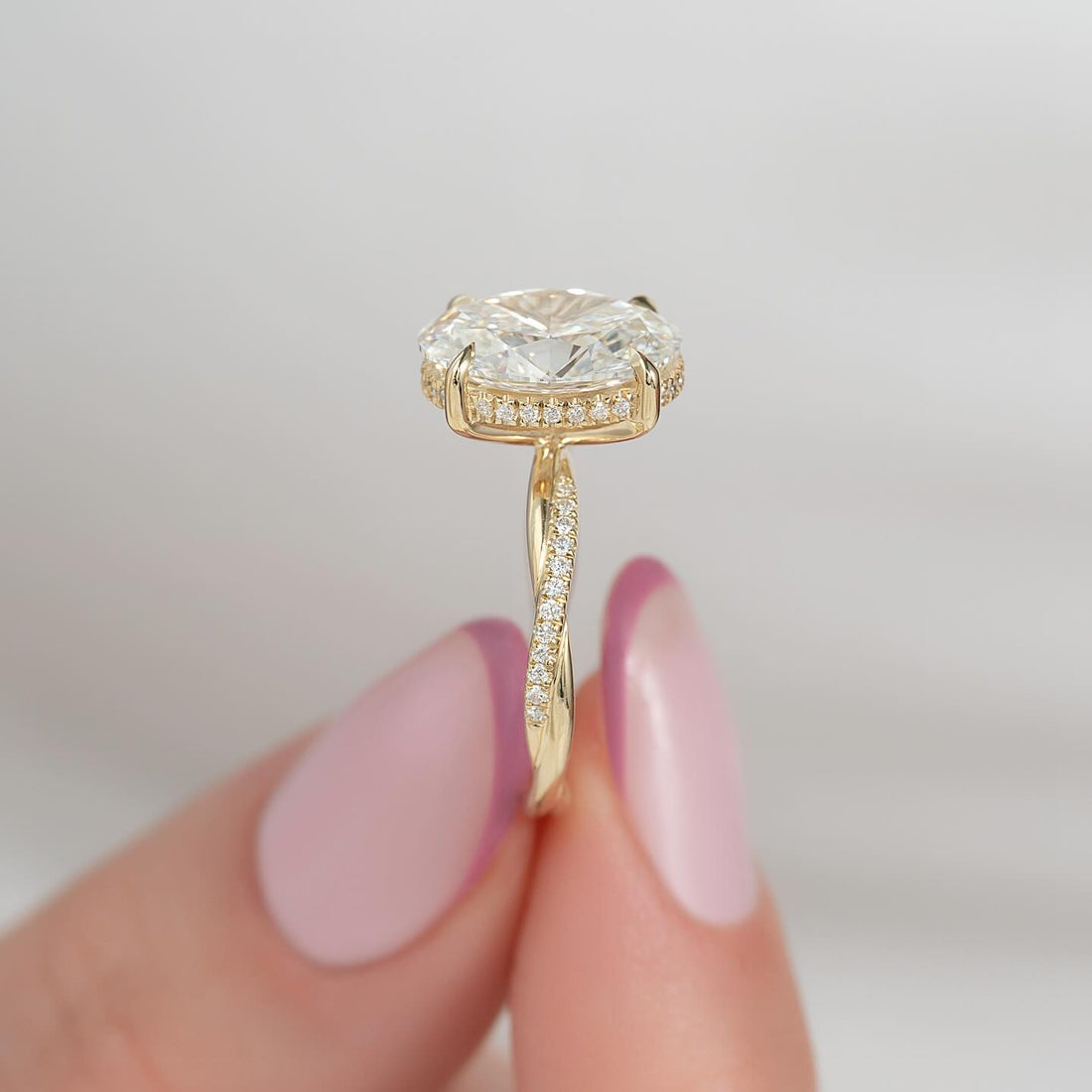 Oval Cut Moissanite Hidden Halo Twisted Pavé Engagement Ring in 14K Gold — Mapple Gems