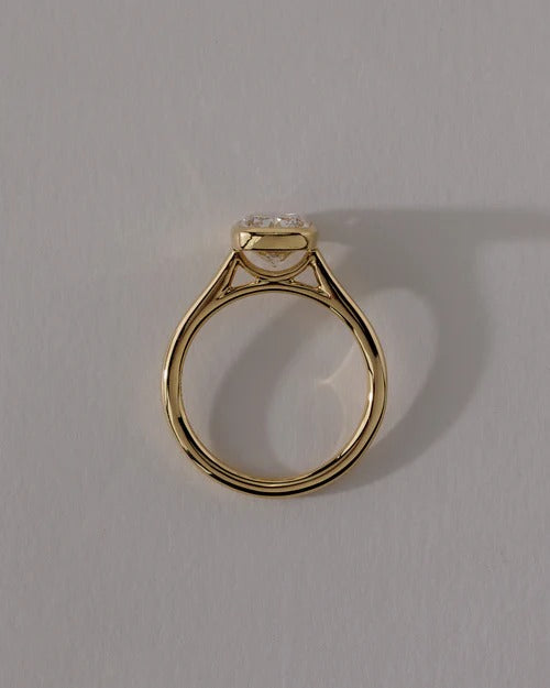 Elongated cushion cut lab grown diamond cathedral bezel ring side profile