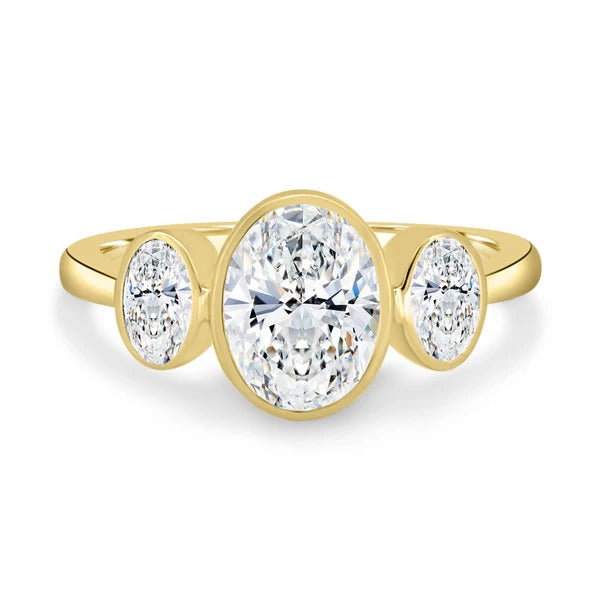 Oval cut moissanite three stone trilogy engagement ring