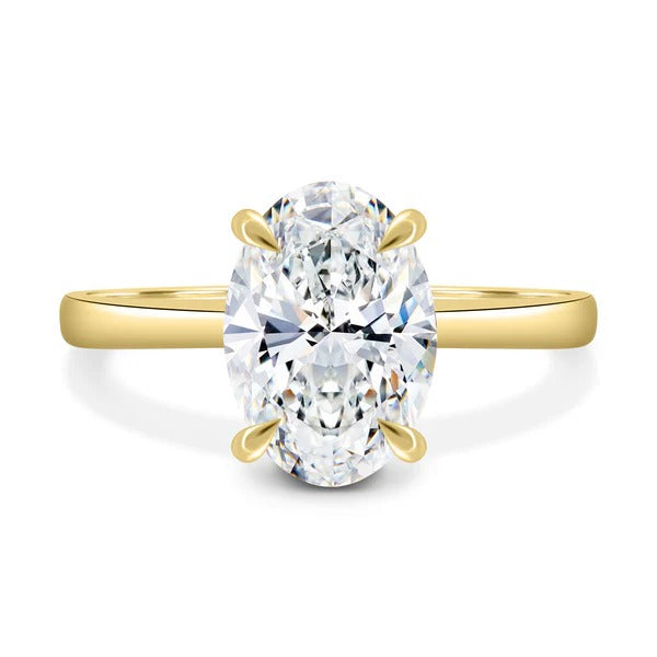 Oval cut lab grown diamond four claw solitaire ring with hidden halo