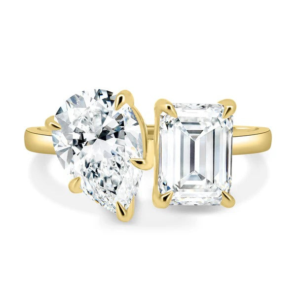 Pear and emerald cut lab grown diamond toi et moi ring