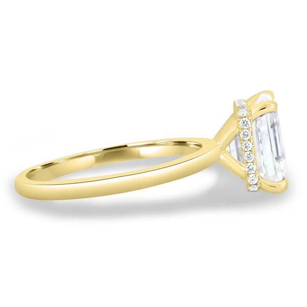 Hidden halo visible beneath emerald cut diamond in side profile