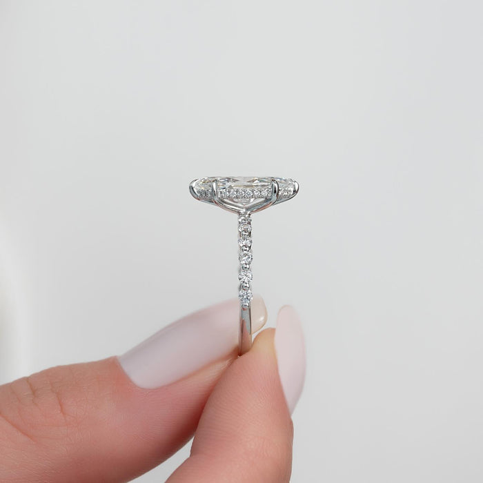 Profile showing the hidden pave halo beneath the marquise diamond