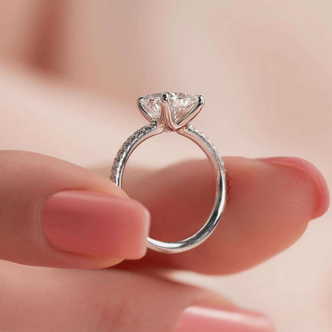 Radiant cut lab grown diamond ring with hidden halo on a micro pave white gold shank